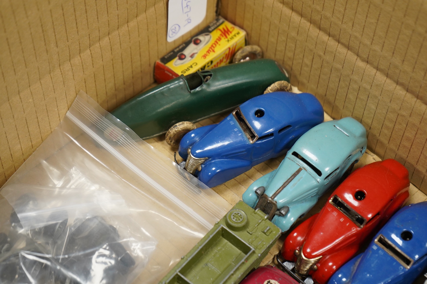 Twenty-eight diecast and tinplate vehicles by Dinky Toys, Schuco, Crescent, Corgi Toys, etc., including a good selection of single seat racing cars, three Schuco telesteering cars, etc.